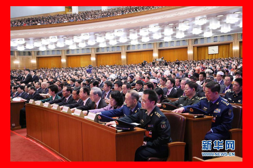 3月20日，第十三屆全國(guó)人民代表大會(huì)第一次會(huì)議閉幕會(huì)。這是代表在表決。