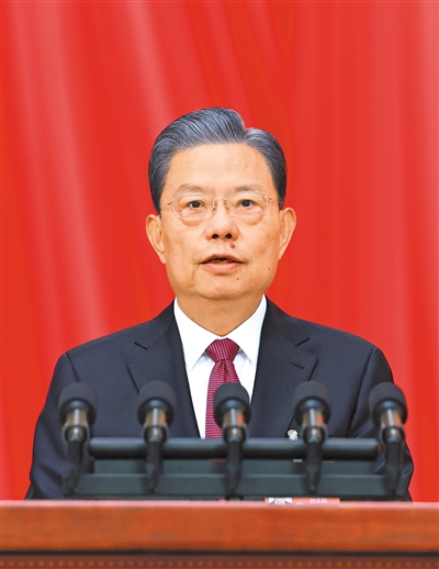 3月8日，十四屆全國人大二次會議在北京人民大會堂舉行第二次全體會議。受全國人大常委會委托，趙樂際委員長向大會報告全國人大常委會工作。 　　新華社記者 王 曄攝