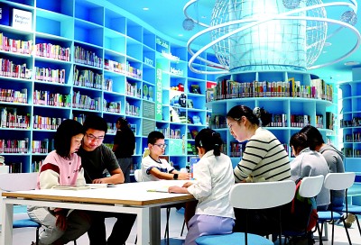 寧波少年兒童圖書館內親子共讀。寧波市委宣傳部提供